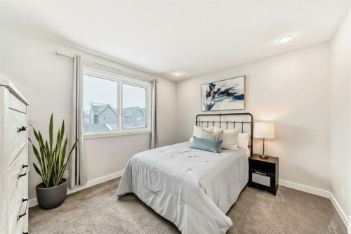 36 Carringvue Way Nw, Calgary, AB - Indoor Photo Showing Bedroom
