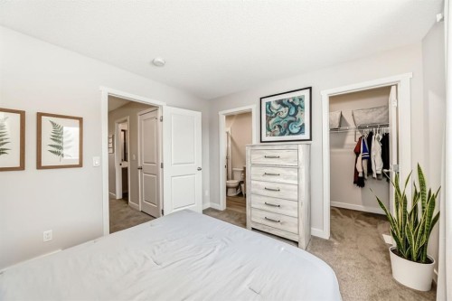 36 Carringvue Way Nw, Calgary, AB - Indoor Photo Showing Bedroom