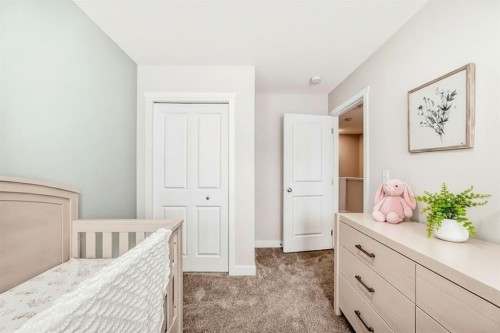 36 Carringvue Way Nw, Calgary, AB - Indoor Photo Showing Bedroom
