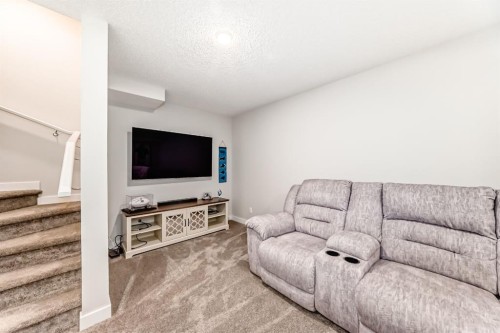 36 Carringvue Way Nw, Calgary, AB - Indoor Photo Showing Living Room