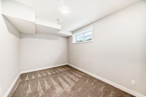 36 Carringvue Way Nw, Calgary, AB - Indoor Photo Showing Other Room