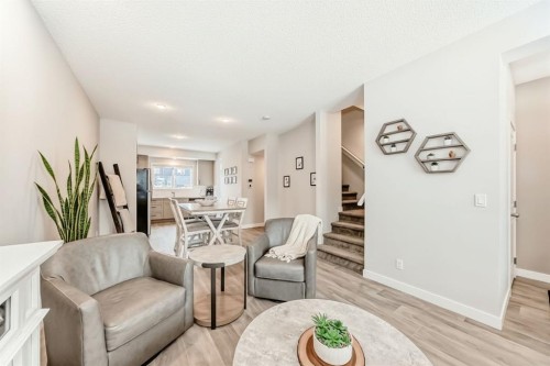 36 Carringvue Way Nw, Calgary, AB - Indoor Photo Showing Living Room