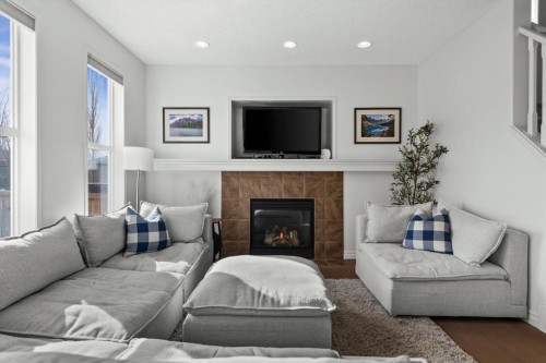 800 Prestwick Circle Se, Calgary, AB - Indoor Photo Showing Living Room With Fireplace