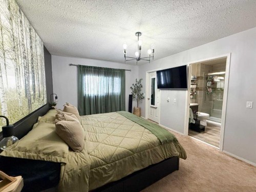 4701 49 Street, Olds, AB - Indoor Photo Showing Bedroom