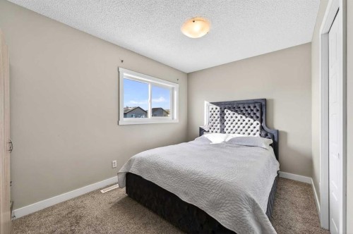 312 Martin Crossing Way Ne, Calgary, AB - Indoor Photo Showing Bedroom