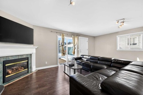 312 Martin Crossing Way Ne, Calgary, AB - Indoor Photo Showing Living Room With Fireplace