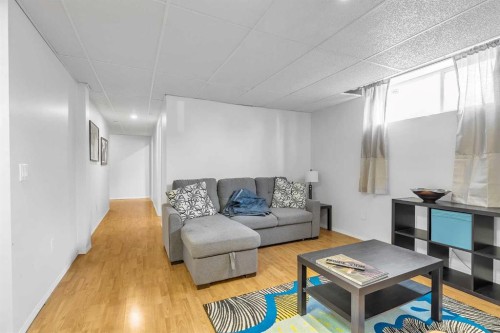 97 Everwillow Close Sw, Calgary, AB - Indoor Photo Showing Living Room