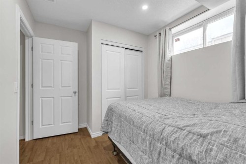 97 Everwillow Close Sw, Calgary, AB - Indoor Photo Showing Bedroom