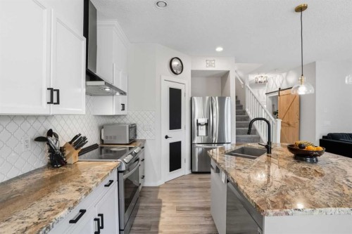 270 Everoak Drive Sw, Calgary, AB - Indoor Photo Showing Kitchen With Stainless Steel Kitchen With Double Sink With Upgraded Kitchen