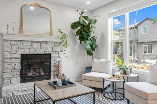 270 Everoak Drive Sw, Calgary, AB - Indoor Photo Showing Living Room With Fireplace