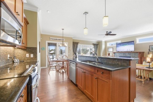 4 Bridle Estates Road Sw, Calgary, AB - Indoor Photo Showing Kitchen With Double Sink With Upgraded Kitchen