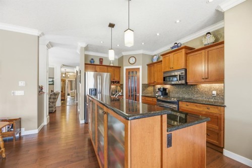 4 Bridle Estates Road Sw, Calgary, AB - Indoor Photo Showing Kitchen With Upgraded Kitchen