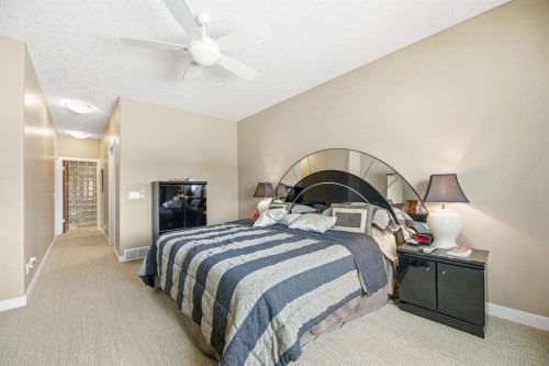 4 Bridle Estates Road Sw, Calgary, AB - Indoor Photo Showing Bedroom
