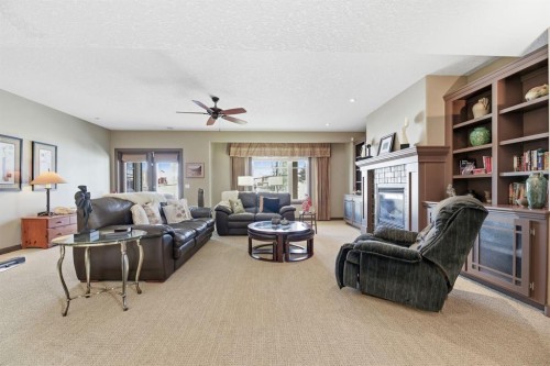 4 Bridle Estates Road Sw, Calgary, AB - Indoor With Fireplace