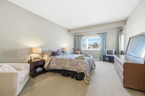 4 Bridle Estates Road Sw, Calgary, AB - Indoor Photo Showing Bedroom