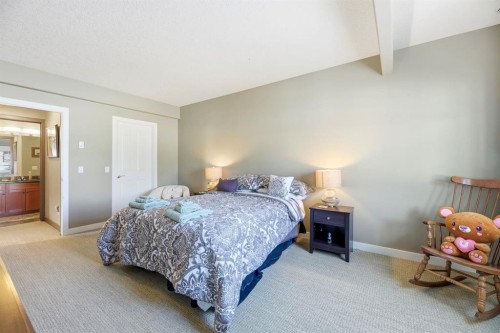 4 Bridle Estates Road Sw, Calgary, AB - Indoor Photo Showing Bedroom