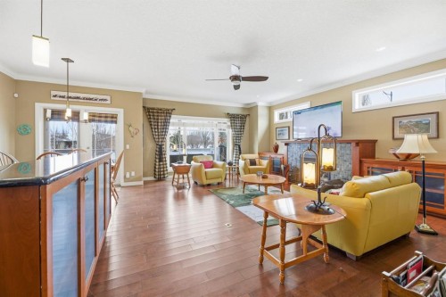 4 Bridle Estates Road Sw, Calgary, AB - Indoor Photo Showing Living Room