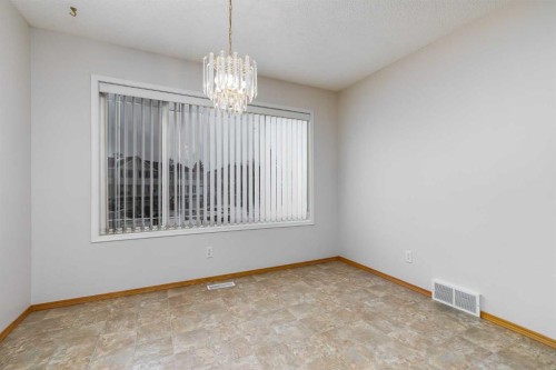 153 Rocky Ridge Court Nw, Calgary, AB - Indoor Photo Showing Other Room