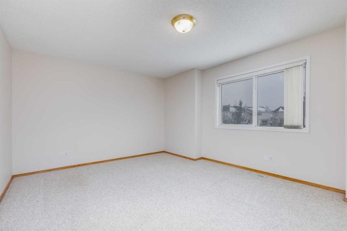 153 Rocky Ridge Court Nw, Calgary, AB - Indoor Photo Showing Other Room