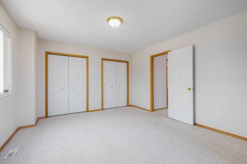 153 Rocky Ridge Court Nw, Calgary, AB - Indoor Photo Showing Other Room