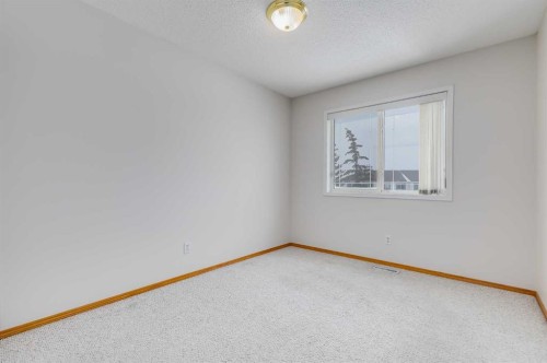 153 Rocky Ridge Court Nw, Calgary, AB - Indoor Photo Showing Other Room