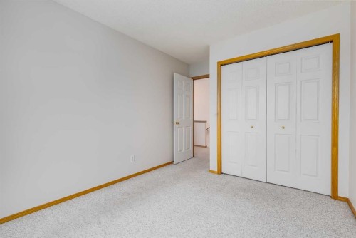 153 Rocky Ridge Court Nw, Calgary, AB - Indoor Photo Showing Other Room