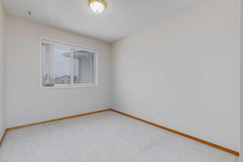 153 Rocky Ridge Court Nw, Calgary, AB - Indoor Photo Showing Other Room