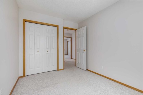 153 Rocky Ridge Court Nw, Calgary, AB - Indoor Photo Showing Other Room