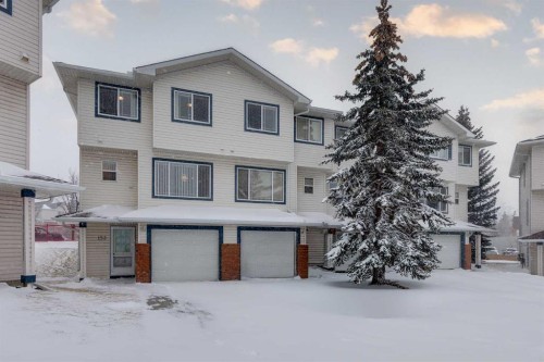 153 Rocky Ridge Court Nw, Calgary, AB - Outdoor With Facade