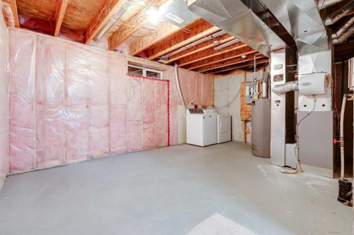153 Rocky Ridge Court Nw, Calgary, AB - Indoor Photo Showing Basement