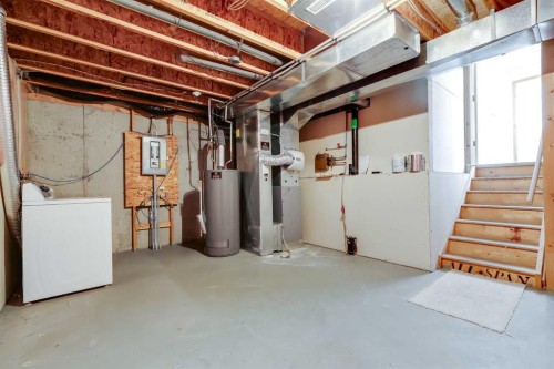 153 Rocky Ridge Court Nw, Calgary, AB - Indoor Photo Showing Basement