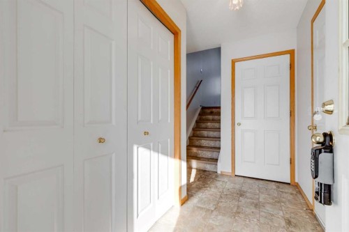 153 Rocky Ridge Court Nw, Calgary, AB - Indoor Photo Showing Other Room