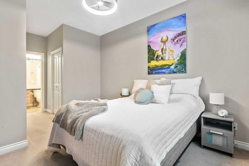 48 Tucker Circle, Okotoks, AB - Indoor Photo Showing Bedroom