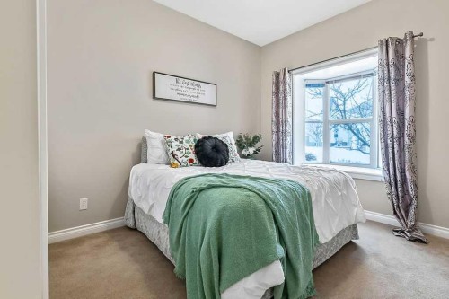 48 Tucker Circle, Okotoks, AB - Indoor Photo Showing Bedroom