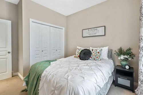 48 Tucker Circle, Okotoks, AB - Indoor Photo Showing Bedroom