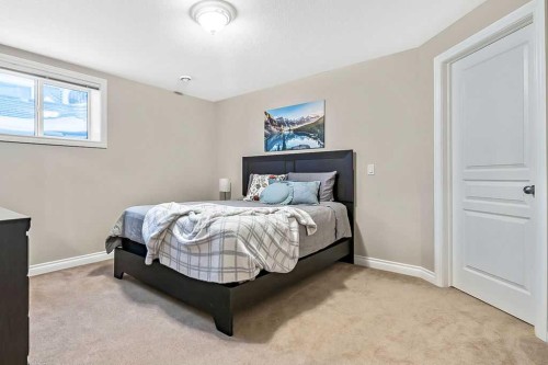 48 Tucker Circle, Okotoks, AB - Indoor Photo Showing Bedroom