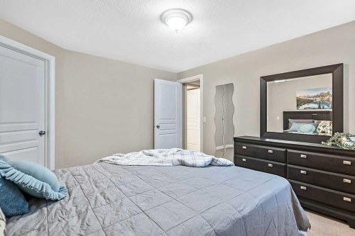 48 Tucker Circle, Okotoks, AB - Indoor Photo Showing Bedroom