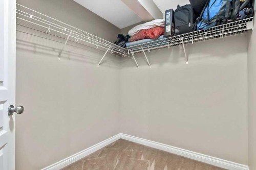 48 Tucker Circle, Okotoks, AB - Indoor With Storage