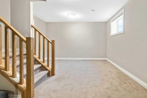 48 Tucker Circle, Okotoks, AB - Indoor Photo Showing Other Room
