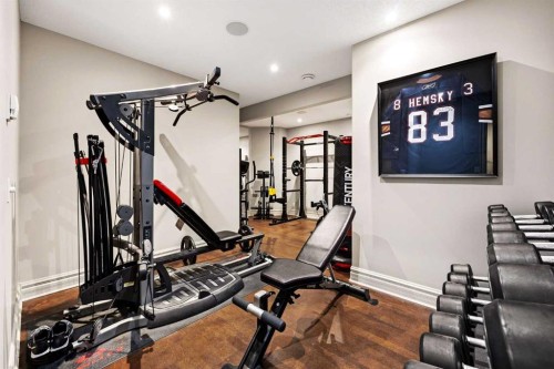 140 Gleneagles Landing, Cochrane, AB - Indoor Photo Showing Gym Room