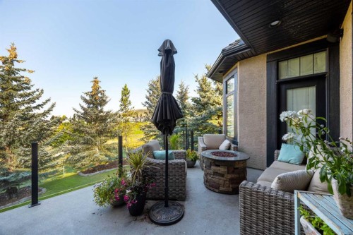 140 Gleneagles Landing, Cochrane, AB - Outdoor With Exterior