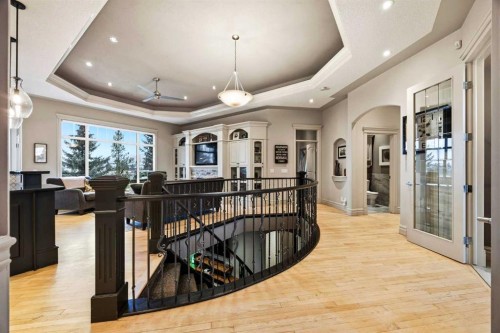 140 Gleneagles Landing, Cochrane, AB - Indoor Photo Showing Other Room