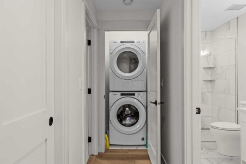 402-1315 Spring Creek Gate, Canmore, AB - Indoor Photo Showing Laundry Room