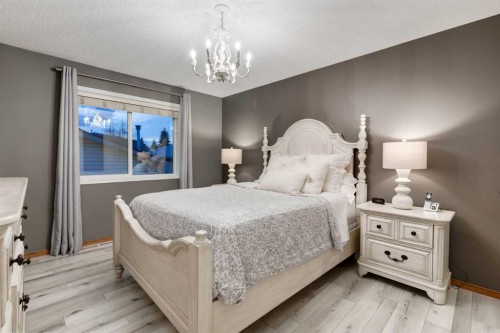 117 Cramond Crescent Se, Calgary, AB - Indoor Photo Showing Bedroom