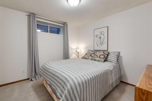 117 Cramond Crescent Se, Calgary, AB - Indoor Photo Showing Bedroom