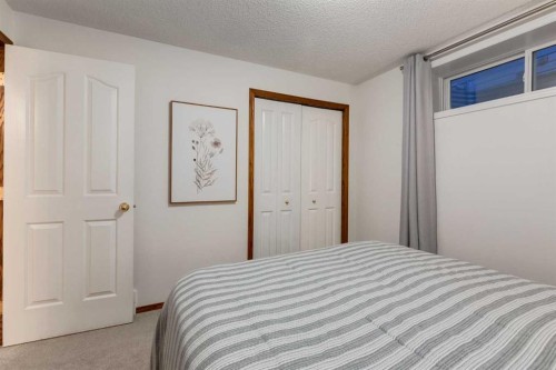 117 Cramond Crescent Se, Calgary, AB - Indoor Photo Showing Bedroom