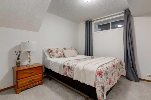 117 Cramond Crescent Se, Calgary, AB - Indoor Photo Showing Bedroom
