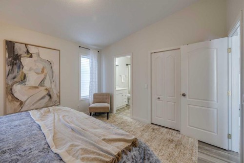 10 Somerside Manor Sw, Calgary, AB - Indoor Photo Showing Bedroom