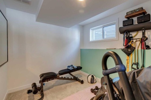 10 Somerside Manor Sw, Calgary, AB - Indoor Photo Showing Gym Room