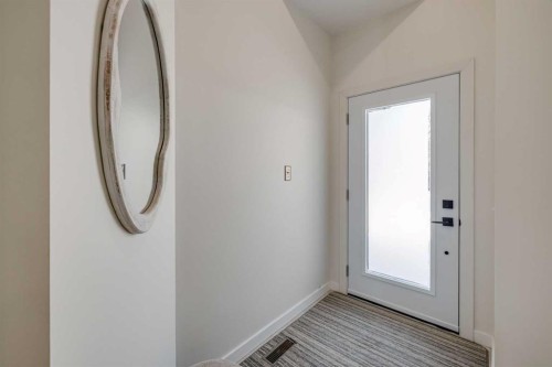 10 Somerside Manor Sw, Calgary, AB - Indoor Photo Showing Other Room